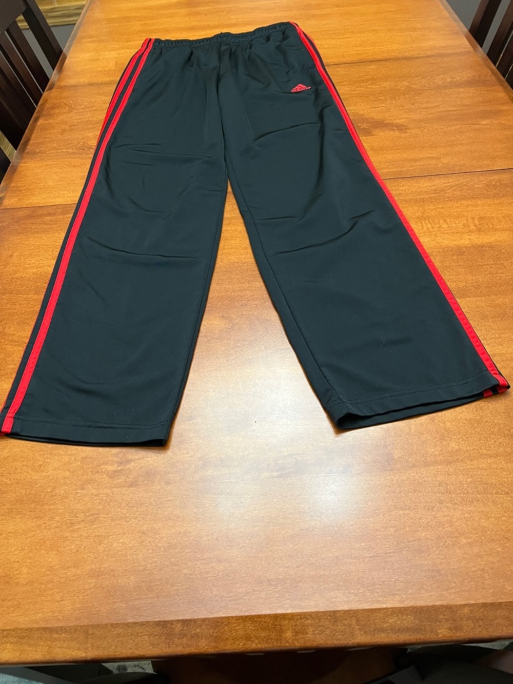 Adidas men’s essentials warm up pants.
